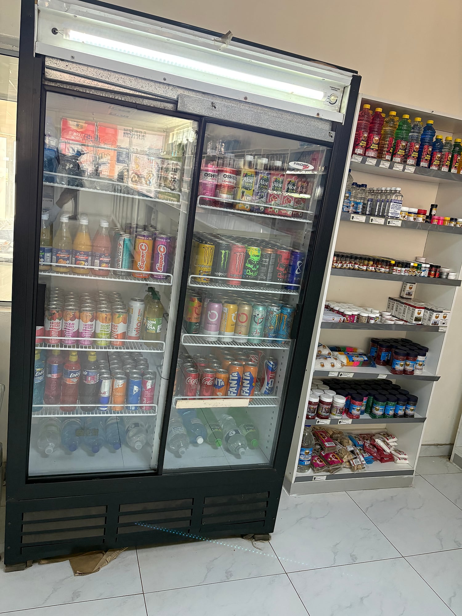 Cold drinks fridge and convenience shelf